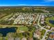 Pictureseque aerial view of the neighborhood, golf course and lake at 7290 Se 172Nd Legacy Ln, The Villages, FL 32162