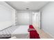 Bedroom with a Murphy bed and built in shelving next to the closets at 7290 Se 172Nd Legacy Ln, The Villages, FL 32162