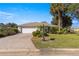 Charming single-story home with a well-manicured lawn and a brick driveway at 7290 Se 172Nd Legacy Ln, The Villages, FL 32162