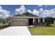 Charming single-story home featuring a two-car garage and well-maintained landscaping at 9317 Sw 60Th Court Rd, Ocala, FL 34476
