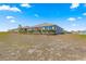 Exterior of the house features a spacious backyard, perfect for outdoor activities and entertainment at 9617 Sw 102Nd Ter, Ocala, FL 34481