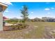 Enjoy neighborhood views from this backyard featuring a beautiful patio, landscaping, and green space at 9617 Sw 102Nd Ter, Ocala, FL 34481