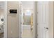 Well-lit bathroom features a tub, shower, and neutral tile, creating a serene atmosphere at 9617 Sw 102Nd Ter, Ocala, FL 34481