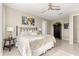 Relaxing bedroom with a ceiling fan and soft decor, perfect for a peaceful retreat at 9617 Sw 102Nd Ter, Ocala, FL 34481