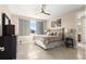 Relaxing bedroom with a ceiling fan and soft decor, perfect for a peaceful retreat at 9617 Sw 102Nd Ter, Ocala, FL 34481