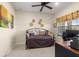 This cozy home office features natural light and plenty of space for a computer and desk at 9617 Sw 102Nd Ter, Ocala, FL 34481