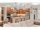 Beautiful kitchen with stainless steel appliances, granite countertops and a large central island with bar stool seating at 9617 Sw 102Nd Ter, Ocala, FL 34481