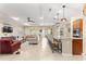 Spacious open-concept living room, kitchen, and dining area with modern finishes and ample natural light at 9617 Sw 102Nd Ter, Ocala, FL 34481