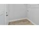 Mud room features wire shelving, a utility closet and a door to outside at 14363 Sw 27 St, Ocala, FL 34481