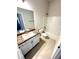Clean bathroom with granite vanity, shower-tub combo, and neutral tiling for a modern feel at 3106 Ne 46Th Ave, Ocala, FL 34470