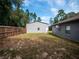 View of the metal storage building in the backyard, adjacent to the main home at 12805 Sw 64Th Ln, Ocala, FL 34481