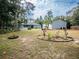 Yard with home, pool, and detached garage at 12805 Sw 64Th Ln, Ocala, FL 34481
