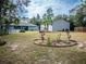 House backyard with shed and small garden at 12805 Sw 64Th Ln, Ocala, FL 34481