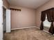 Spacious bedroom with neutral walls and carpet at 12805 Sw 64Th Ln, Ocala, FL 34481
