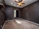 Cozy bedroom featuring a carpeted floor, ceiling fan and a window allowing natural light at 12805 Sw 64Th Ln, Ocala, FL 34481