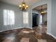 Dining area with tile floors and a chandelier at 12805 Sw 64Th Ln, Ocala, FL 34481