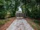 Long private driveway leading to gated property at 12805 Sw 64Th Ln, Ocala, FL 34481