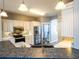 Spacious kitchen with stainless steel appliances and granite countertops at 12805 Sw 64Th Ln, Ocala, FL 34481