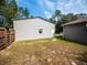 Exterior of metal shed with single door and window at 12805 Sw 64Th Ln, Ocala, FL 34481