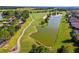 Picturesque golf course with a serene lake view at 6014 Sw 93Rd Cir, Ocala, FL 34481