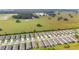 Community view of houses with attached garages and large lot at 6014 Sw 93Rd Cir, Ocala, FL 34481