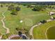 Golf course with driving range and a peaceful lake at 6014 Sw 93Rd Cir, Ocala, FL 34481