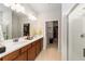 Double vanity bathroom with walk-in shower and large closet at 6014 Sw 93Rd Cir, Ocala, FL 34481
