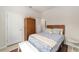 Cozy bedroom with wood accents and plenty of closet space at 6014 Sw 93Rd Cir, Ocala, FL 34481