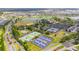 Aerial view of community tennis and pickleball courts at 6014 Sw 93Rd Cir, Ocala, FL 34481