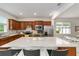 Modern kitchen with an island and stainless steel appliances at 6014 Sw 93Rd Cir, Ocala, FL 34481
