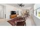 Living room with TV, seating area, and open floor plan at 6014 Sw 93Rd Cir, Ocala, FL 34481