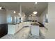 Modern kitchen with granite countertops and modern appliances at 10923 Sw 38Th Ave, Ocala, FL 34476