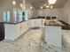 Large eat in kitchen includes granite countertops and modern backsplash at 10923 Sw 38Th Ave, Ocala, FL 34476
