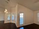 Inviting living area with hardwood floors, decorative lighting, and a bright, open layout at 10923 Sw 38Th Ave, Ocala, FL 34476