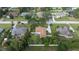 High-angle shot displaying the home's location, surrounding greenery, and neighborhood layout at 10291 Se 42Nd Ter, Belleview, FL 34420