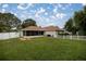 This home boasts a spacious fenced-in backyard with a screened-in lanai and room for outdoor dining at 10291 Se 42Nd Ter, Belleview, FL 34420