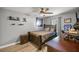 Bedroom with a ceiling fan, decorative wall art, and a cozy bed for a restful night's sleep at 10291 Se 42Nd Ter, Belleview, FL 34420