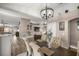 This light and bright dining room boasts stylish decor with hardwood floors at 10291 Se 42Nd Ter, Belleview, FL 34420
