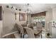 This dining room offers seating for six and views of the backyard at 10291 Se 42Nd Ter, Belleview, FL 34420