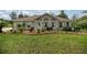 Charming home with a well-manicured lawn and garden at 10291 Se 42Nd Ter, Belleview, FL 34420