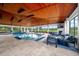 Resort-style pool area with covered patio and lounge seating at 6160 W Highway 326, Ocala, FL 34482