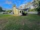 Spacious backyard with home and grassy lawn at 730 Ne 18Th Ave, Ocala, FL 34470