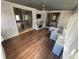 Sunroom with wood floors, sliding doors and comfy couch at 730 Ne 18Th Ave, Ocala, FL 34470