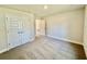 Bedroom with neutral carpet and large closet space, providing ample storage at 8949 Se 159Th Ln, Summerfield, FL 34491