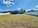Large backyard with a privacy fence surrounding the perimeter at 9869 Se 157Th Ln, Summerfield, FL 34491