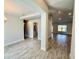 Bright living room features tile floors and neutral walls, creating a modern and inviting space at 9869 Se 157Th Ln, Summerfield, FL 34491