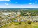 Wide aerial view showing the home's location within a neighborhood at 12576 Se 97Th Terrace Rd, Summerfield, FL 34491