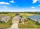 Aerial view of a house on a golf course community at 12576 Se 97Th Terrace Rd, Summerfield, FL 34491