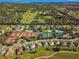 Aerial view of community and tennis courts at 12576 Se 97Th Terrace Rd, Summerfield, FL 34491