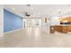 Open concept living space combining kitchen, dining, and living areas at 12576 Se 97Th Terrace Rd, Summerfield, FL 34491